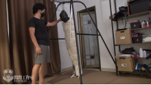 Miao mummified and hanged