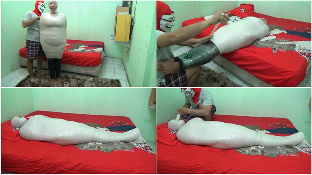 A fat girl is mummified and gets a breathplay in her room
