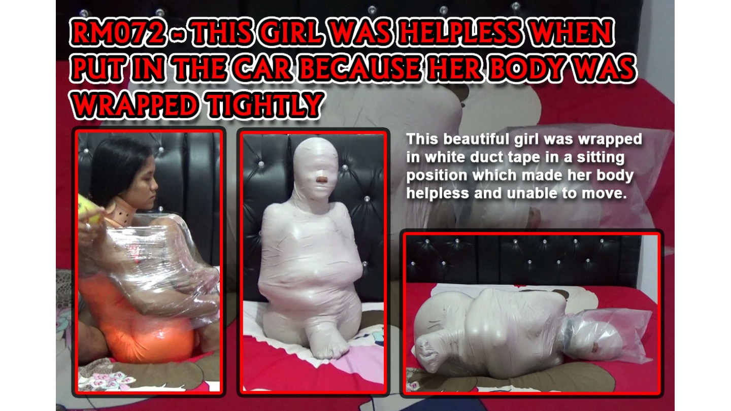 この少女は車に乗せられたとき、体をしっかりと包まれて無力だった
