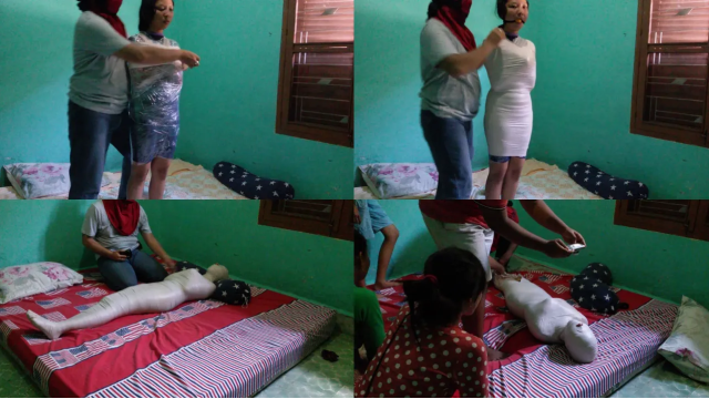 This Girl Was Wrapped In A Mummy And Posed Like A Real Mummy With Her Arms Crossed In Front