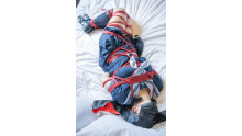A girl in a navy blue sailor suit is strangled and played with toys (Rko)